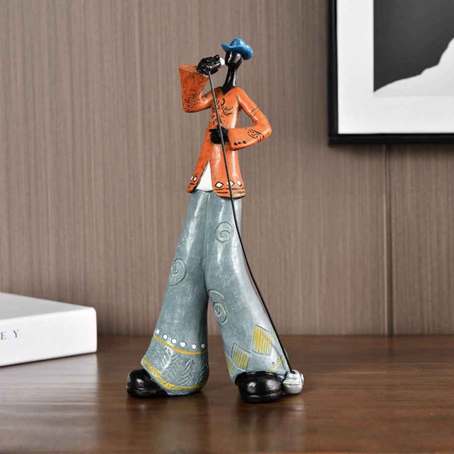Sculpture d'art moderne représentant un musicien de jazz en résine, idéale pour salon ou bureau.