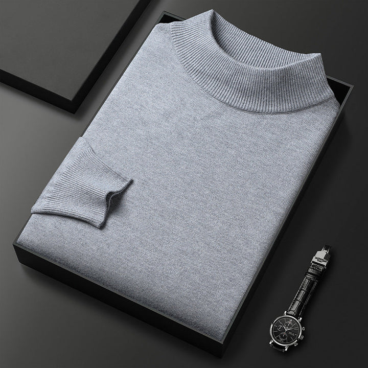 Pull homme hiver coupe élégante, col mi-montant, confort optimal pour une mode masculine stylée.
