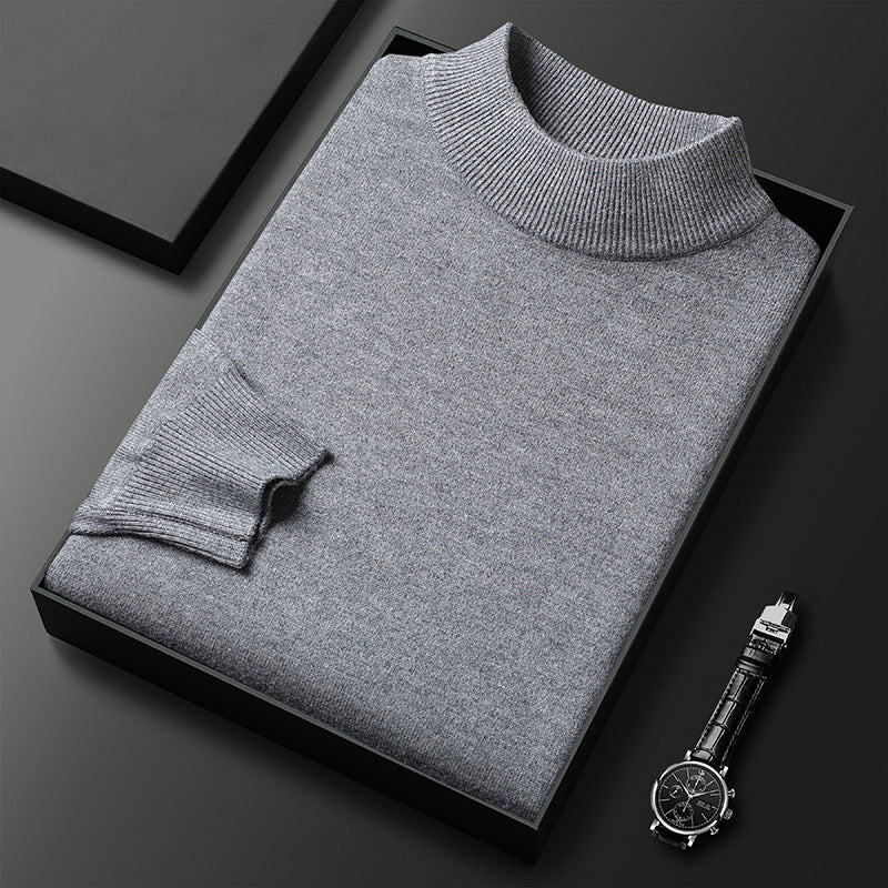 Pull homme noir élégant col mi-montant, idéal pour l'hiver, confort et style mode masculine.