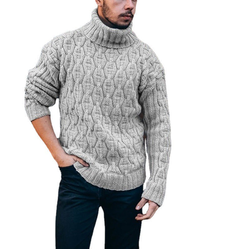 Pull homme élégant col roulé, gros tricot torsadé. Vêtement d'hiver confortable et chic.