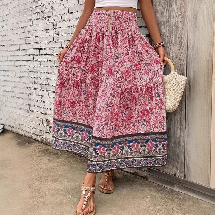 Jupe longue superposée style bohème pour femme, motifs floraux. Parfaite pour un look décontracté printemps-été.
