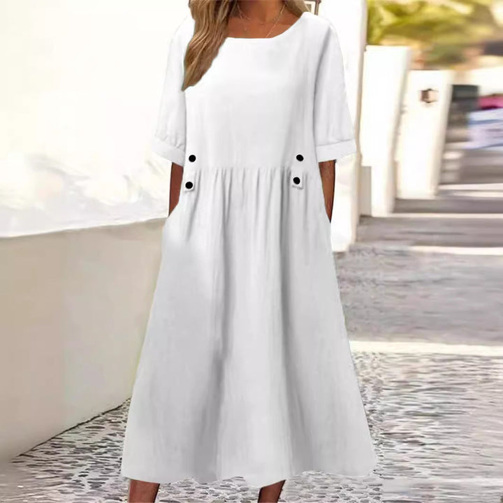 Robe ample femme en coton lin mi-longue, idéale pour un style estival confortable et décontracté.