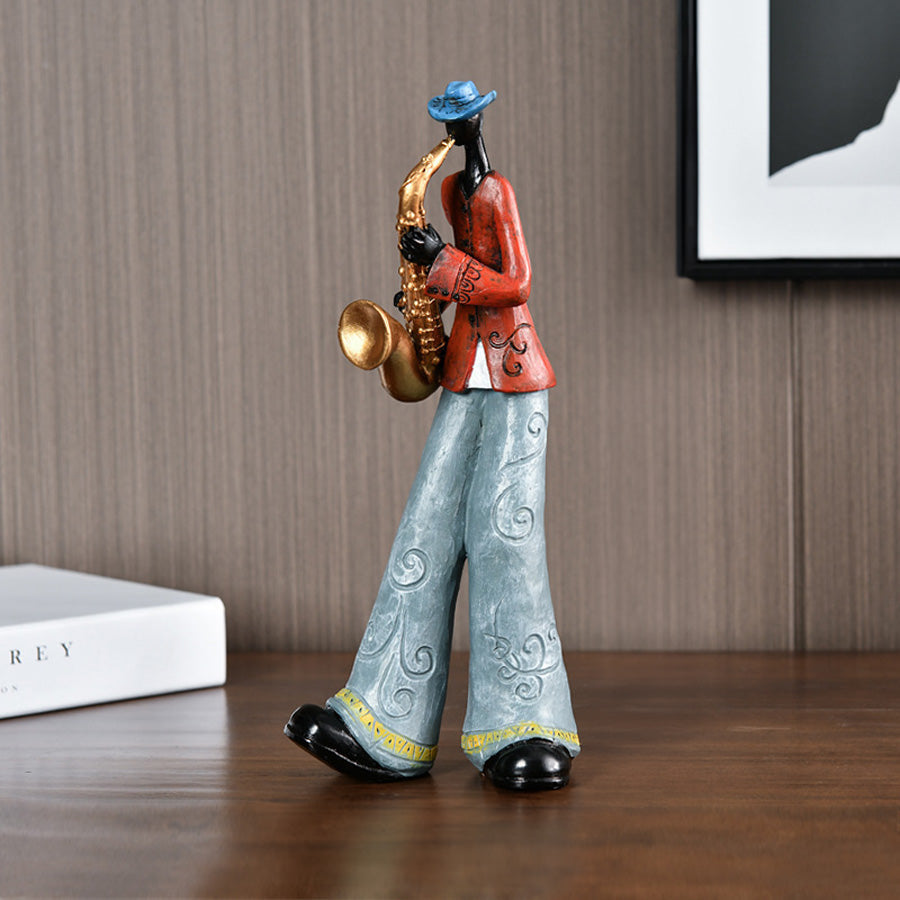 Œuvre d'art en résine : figurine de musicien jazz debout, accent moderne pour toute collection.