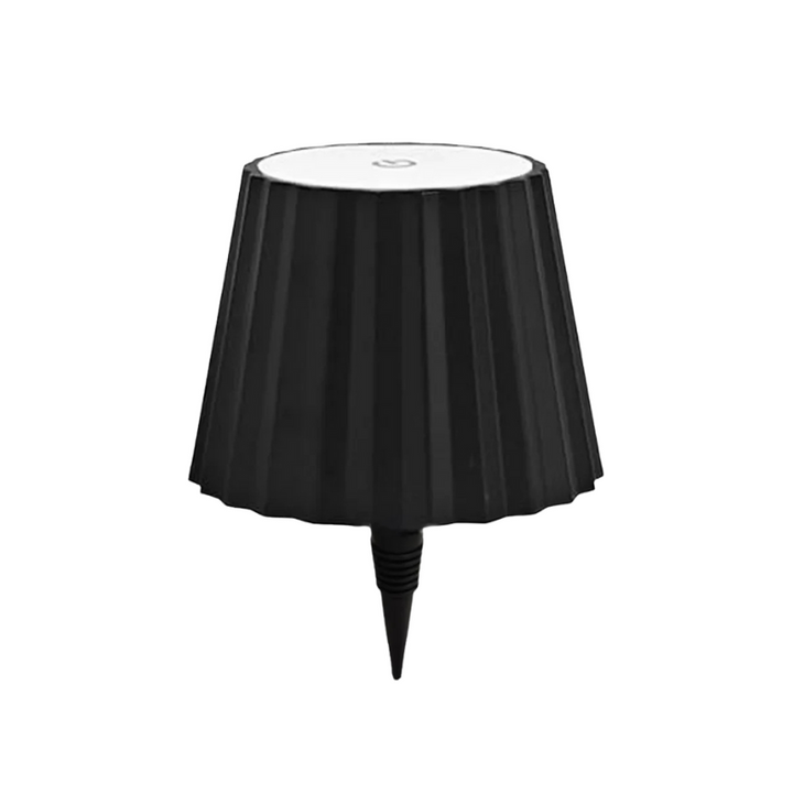 Lampe de table LED design épuré, sans fil, rechargeable USB, idéale pour une décoration intérieure moderne.