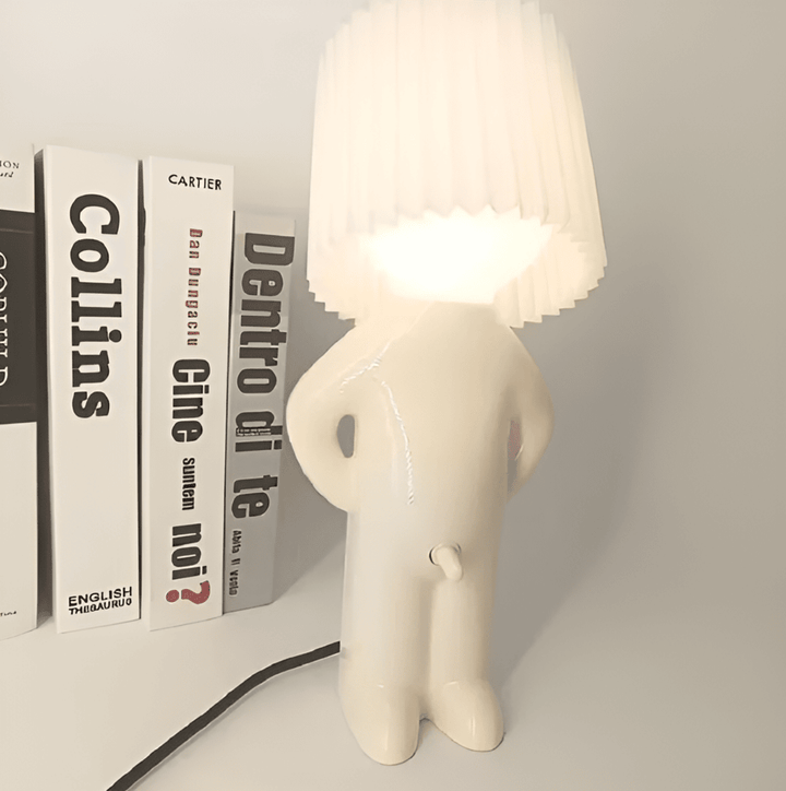 Lumière douce LED émise par cette lampe de table au design figuratif, idéale pour ambiance relaxante.