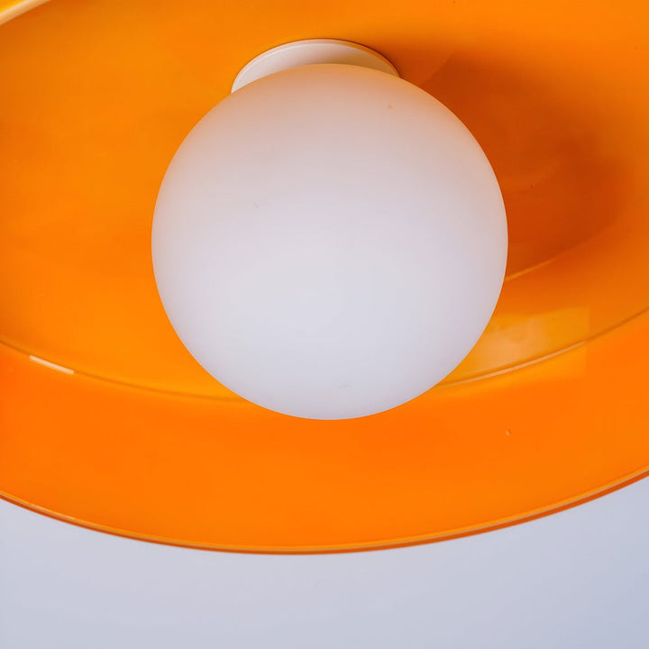 Plafonnier semi-encastré nordique, lumière orange douce pour déco intérieure stylée.