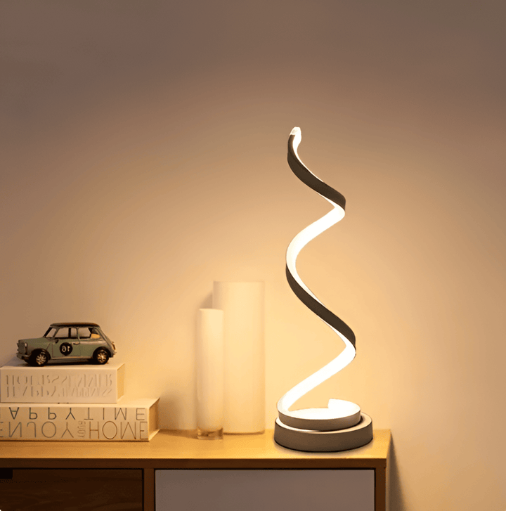 Lampe de table LED spirale, lumière douce et moderne, contrôle tactile pour ajuster l'ambiance facilement.