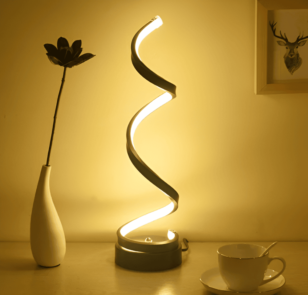 Lampe de table tactile Radiant Curve, LED spirale, design moderne en aluminium brossé pour décoration.