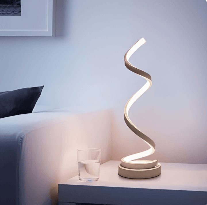 Lampe de table moderne LED spirale, en aluminium, avec contrôle tactile pour un éclairage doux et design.