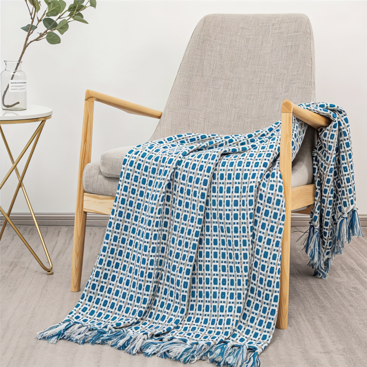 Plaid vintage coloré en polaire avec franges, un ajout douillet et stylé pour votre chambre ou salon.