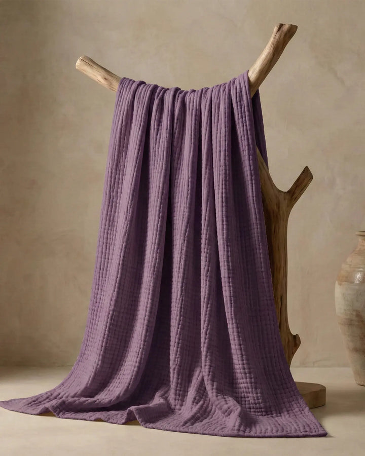 Jeté de lit en coton, respirant et élégant, parfait pour ajouter du style à votre chambre.