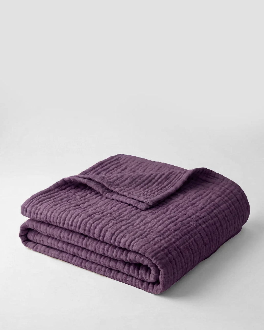 Couverture en coton doux, respirante et naturelle, pour un bien-être optimal à la maison.