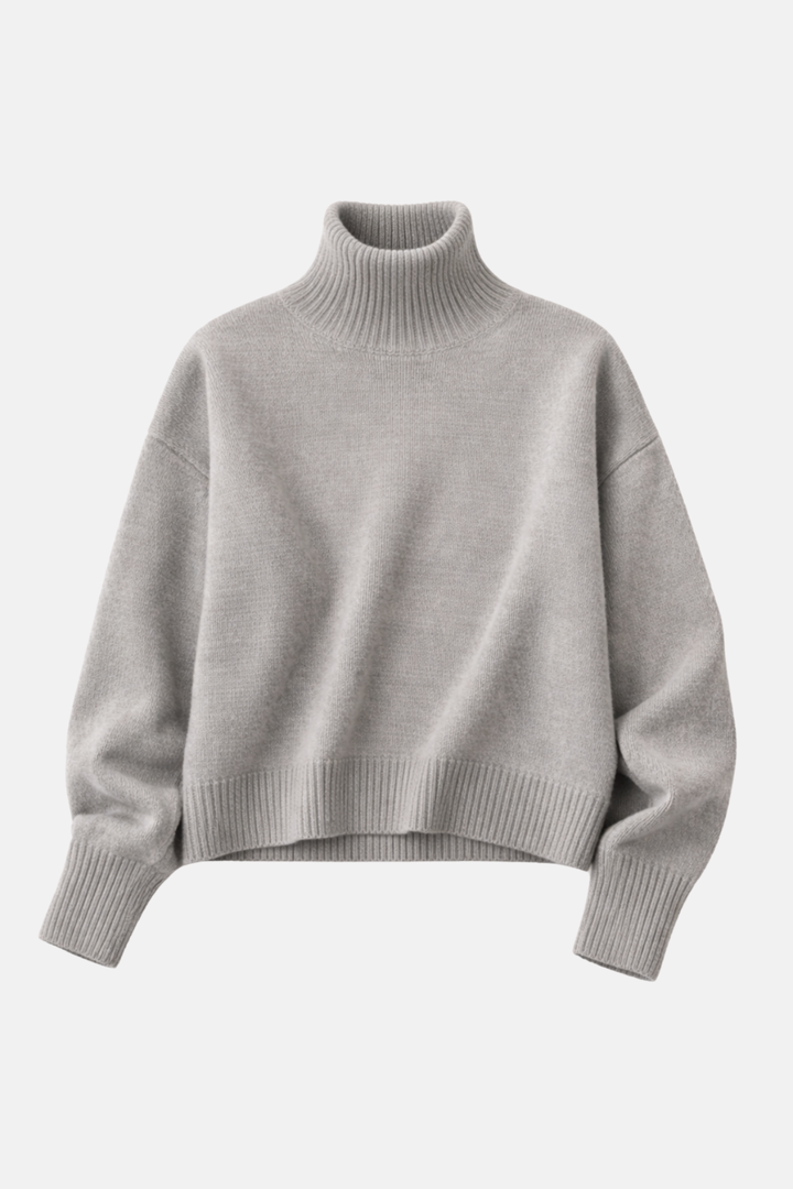 Élégant pull tricoté en laine premium à col roulé pour femme. Parfait pour rester au chaud avec style en hiver.