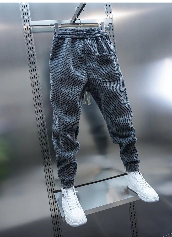 Pantalon de jogging homme polyvalent, confort sportif pour une tenue quotidienne décontractée et un style urbain.