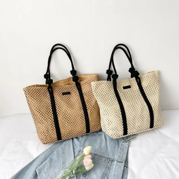 Sac à main de plage pour femme en paille, parfait accessoire estival et fonctionnel.