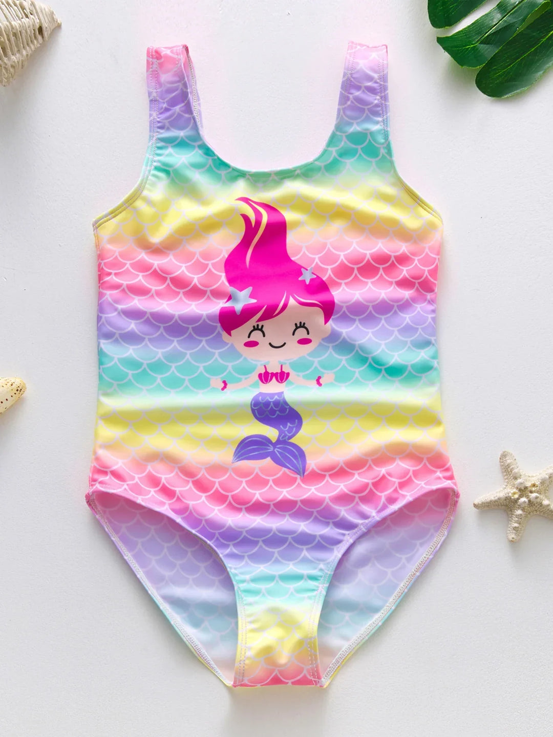 Maillot de bain pour enfant avec motifs de sirène et de licorne, idéal pour la baignade estivale.