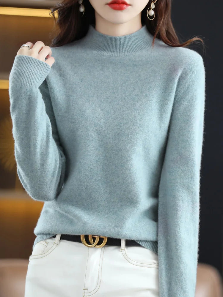 Pull femme douillet, col montant, coupe ample et enveloppante, confort maximal en hiver.