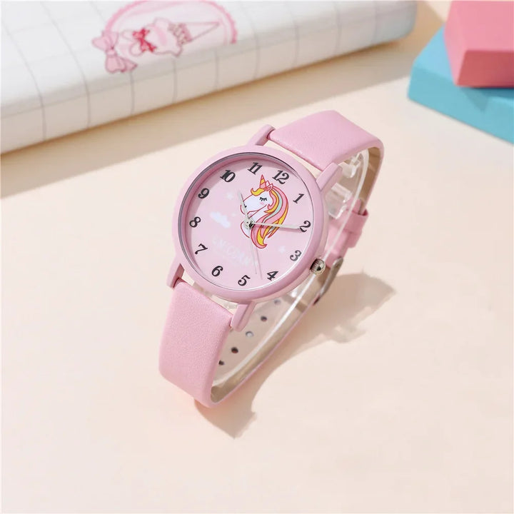 Montre rose licorne pour enfant, bracelet en cuir PU et design mignon. Accessoire amusant pour apprendre l'heure.