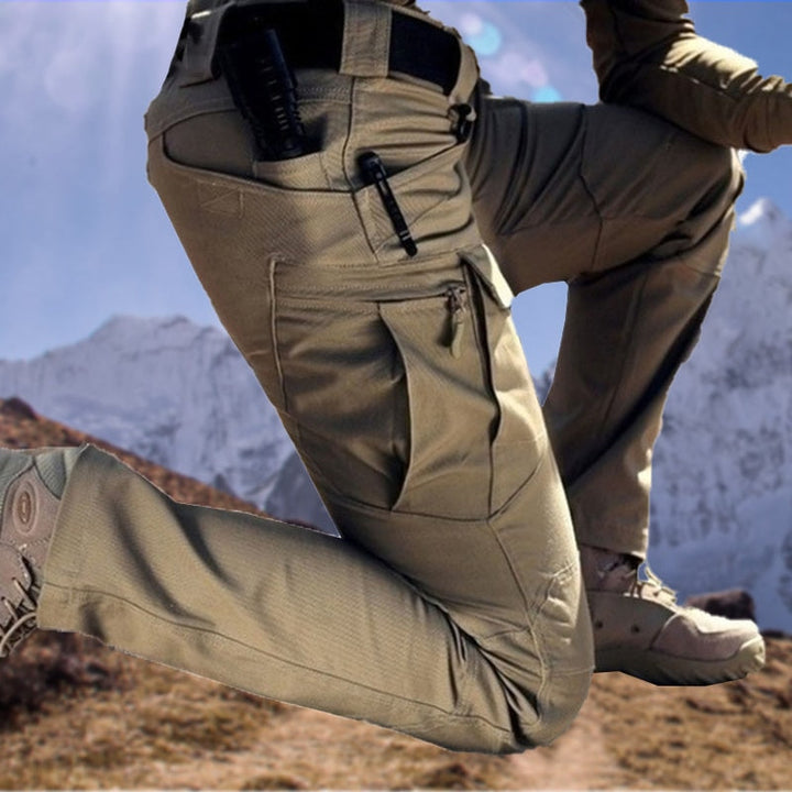 Pantalon tactique stretch homme, robuste, multipoches, idéal randonnée/extérieur.