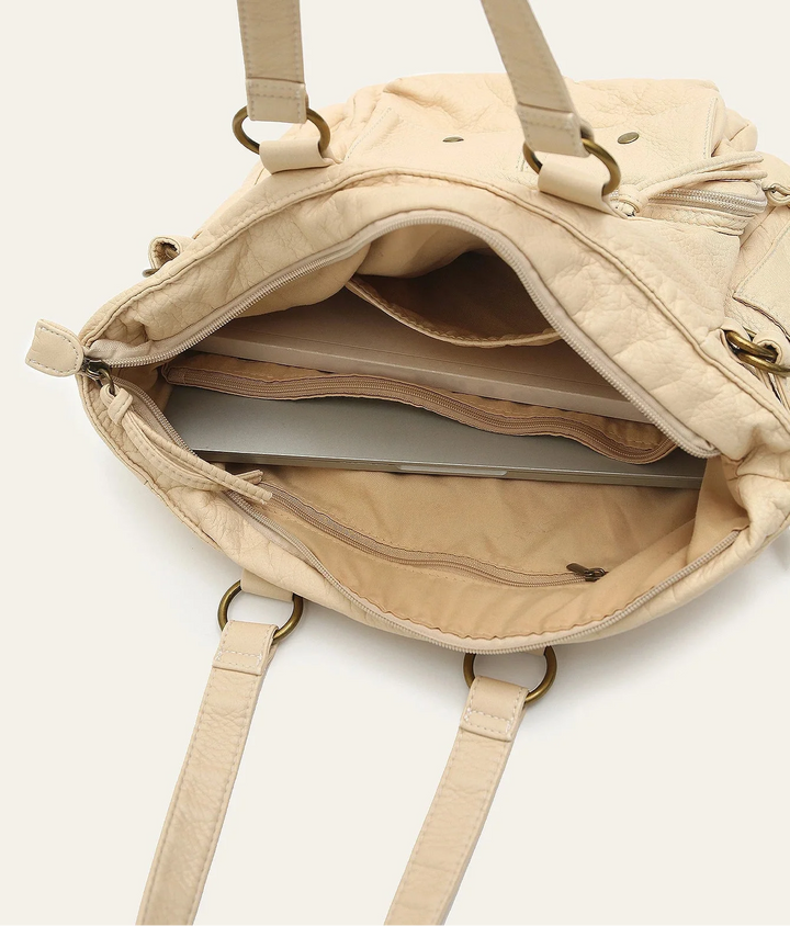 Sac cabas en cuir synthétique beige, grand format, spacieux pour documents de cours et effets personnels.