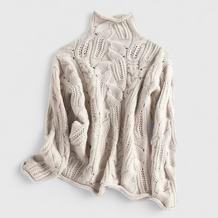 Pull tricoté élégant pour femme, coupe confortable et style chic. Idéal hiver.