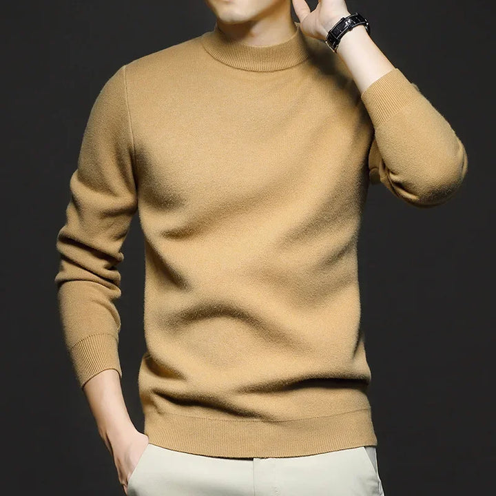 Pull-over homme gris col roulé, idéal pour l'hiver. Doux, chaud et style masculin chic.