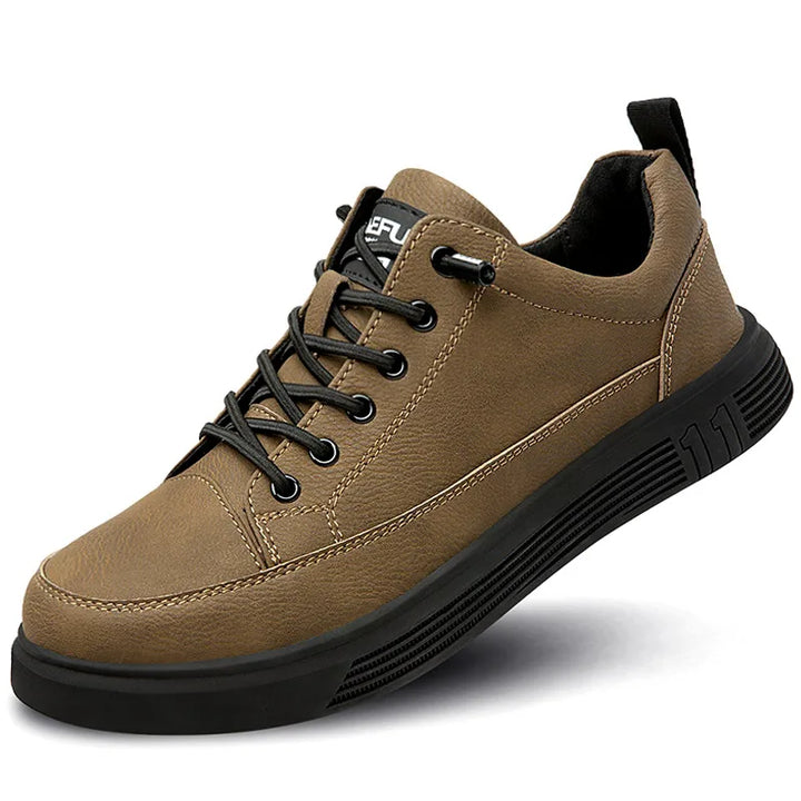 Chaussures de sécurité unisexes imperméables avec embout acier. Protection robuste pour chantier et entrepôt.