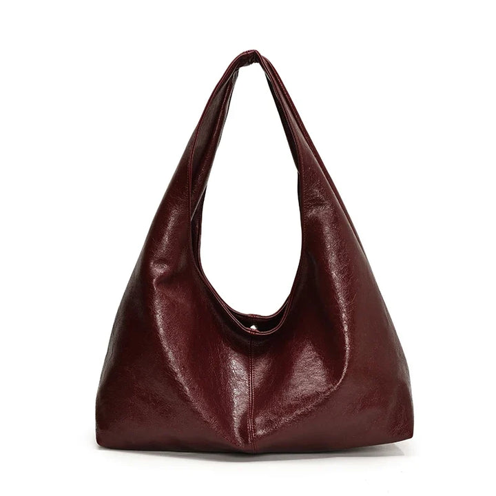 Sac hobo café similicuir, look intemporel, pour femme recherchant confort et style chic.
