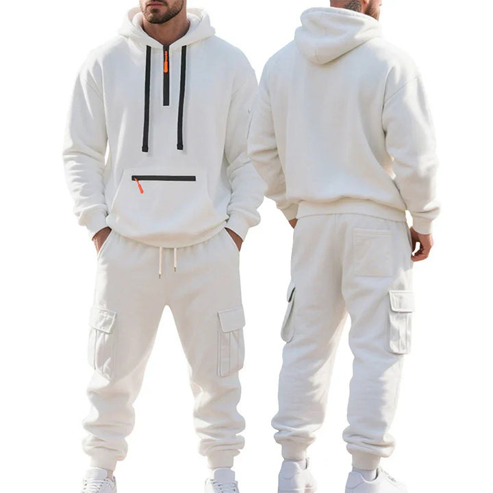 Silhouette masculine élégante en ensemble hiver sportif Alex. Survêtement décontracté et chaud pour homme, style assuré.