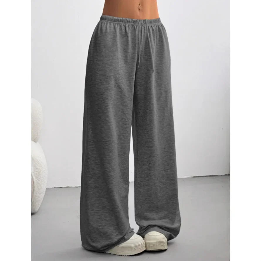 Pantalon large femme marron, taille élastique, coupe ample pour un confort estival et mode décontractée.