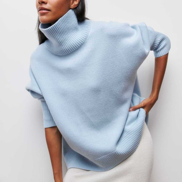 Pull femme hiver chic et confortable, coupe ample et douce. Idéal pour une mode féminine tendance.