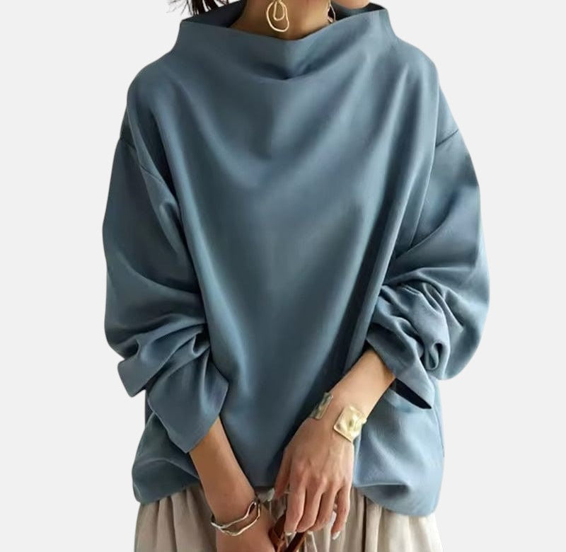 Pull femme chic à col montant, tricot doux et confortable. Parfait pour un look hivernal élégant et polyvalent.