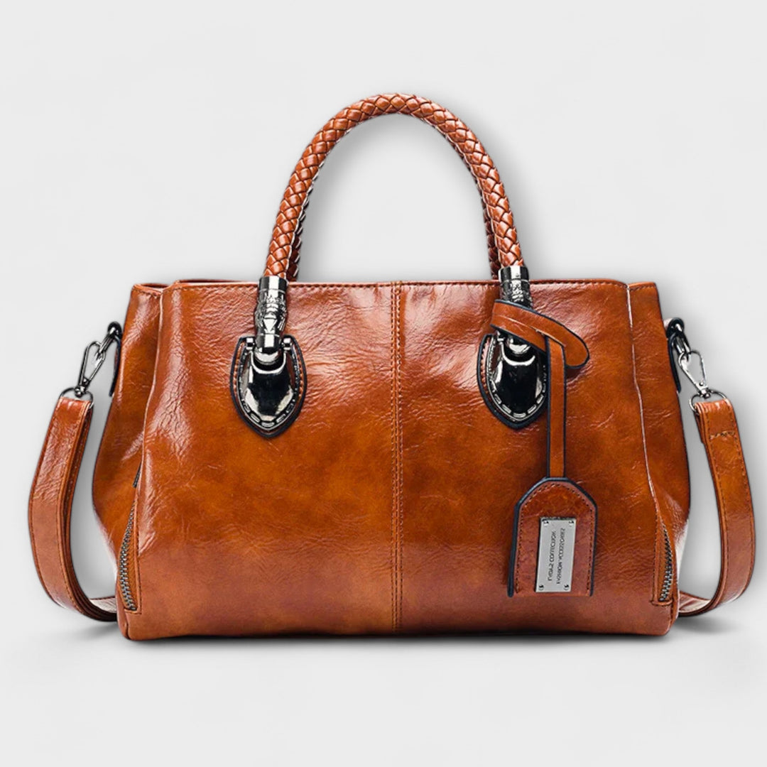 Sac polochon élégant et spacieux pour femme, parfait pour le voyage ou les affaires. Design moderne et chic.