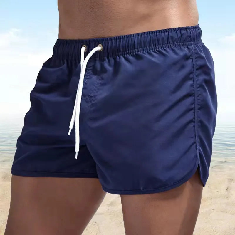 Short de bain homme séchage rapide, idéal pour plage, surf et piscine. Tissu léger et confortable pour l'été.