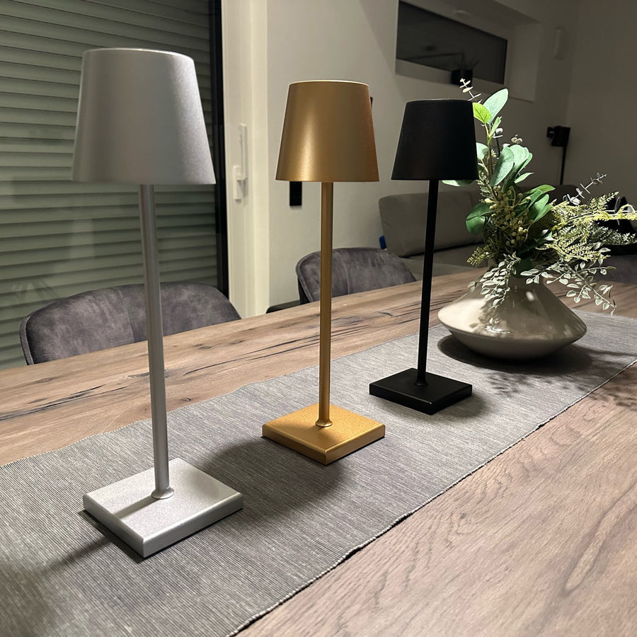 Lampe design LED sans fil pour table, rechargeable, apporte une touche chic à votre décoration moderne.