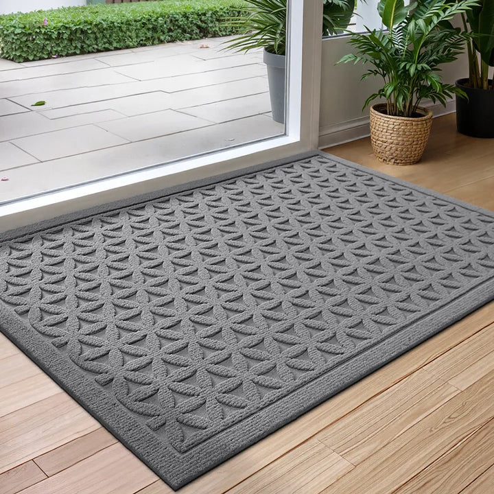 Tapis de porte robuste pour une propreté optimale. Antidérapant, super absorbant et résistant pour votre entrée.