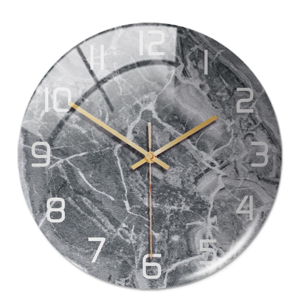 Décoration murale horloge marbre moderne, accessoire maison élégant et discret.