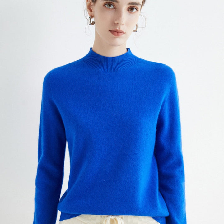 Pull femme chic PARIS en cachemire, manches longues, idéal pour un look élégant et décontracté au bureau.