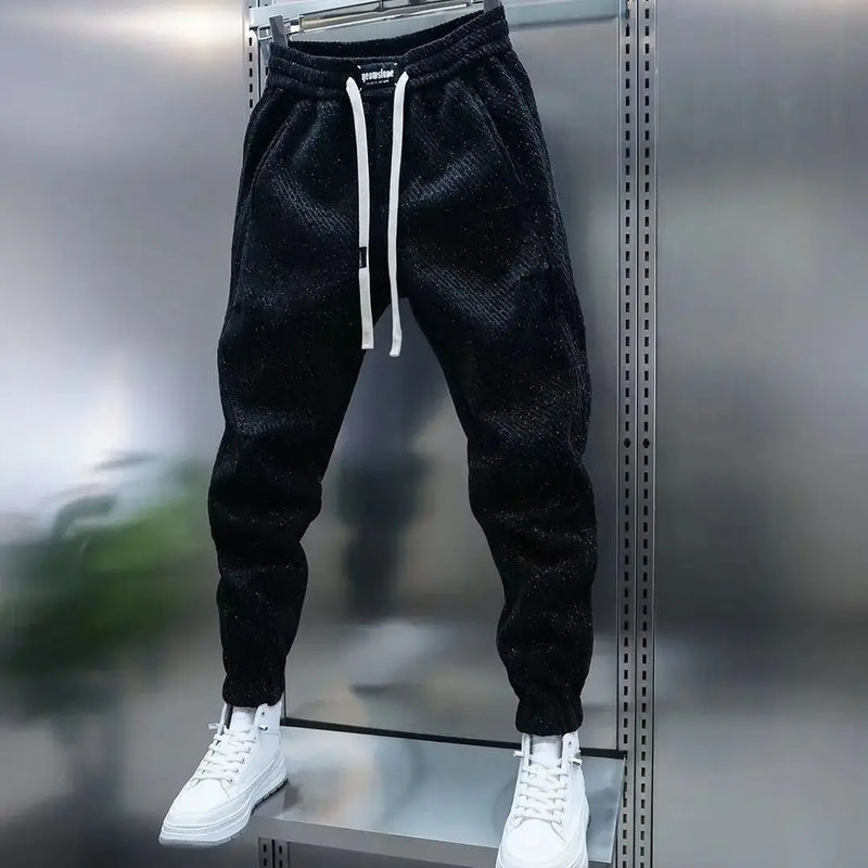 Pantalon jogging pour hommes, doux et confortable. Tenue quotidienne décontractée, idéale pour la mode et le sport léger.