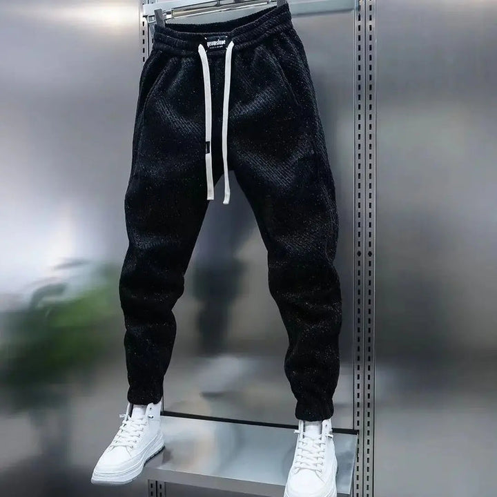 Pantalon jogging pour hommes, doux et confortable. Tenue quotidienne décontractée, idéale pour la mode et le sport léger.