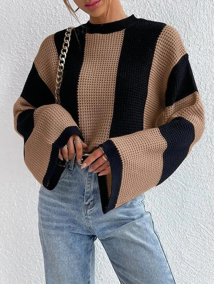 Pull chic femme bicolore, design moderne avec manches amples élégantes, idéal pour un look automne.