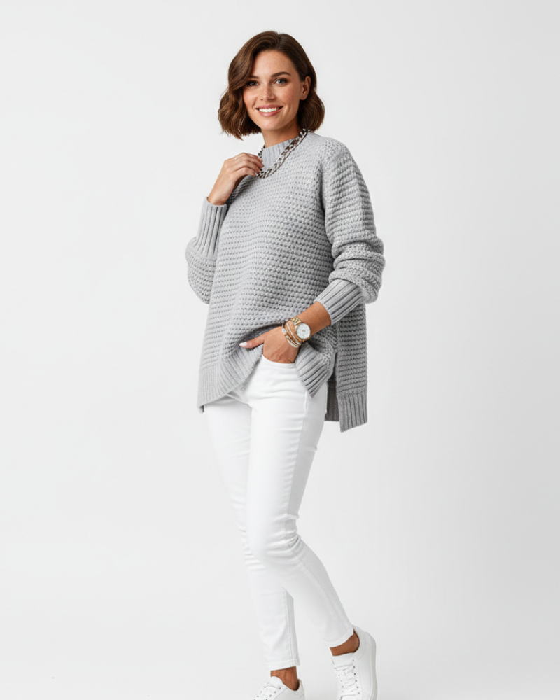 Pull ample femme à col montant, idéal pour l'hiver. Chaud, décontracté et mode pour la saison froide.