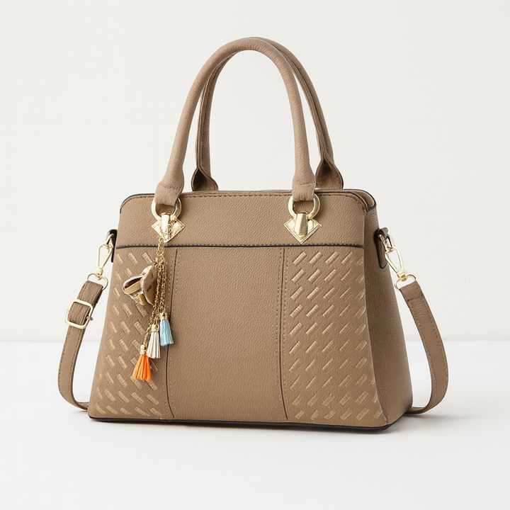 Sac à main chic pour femme, design moderne, bandoulière réglable, accessoire de mode essentiel.