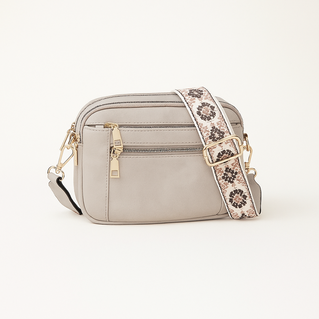 Sac à bandoulière noir élégant pour femme. Accessoire de mode moderne, parfait pour toute occasion.