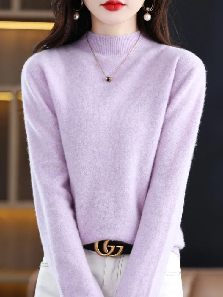 Pull femme confortable, col montant, idéal pour superposition élégante en hiver.