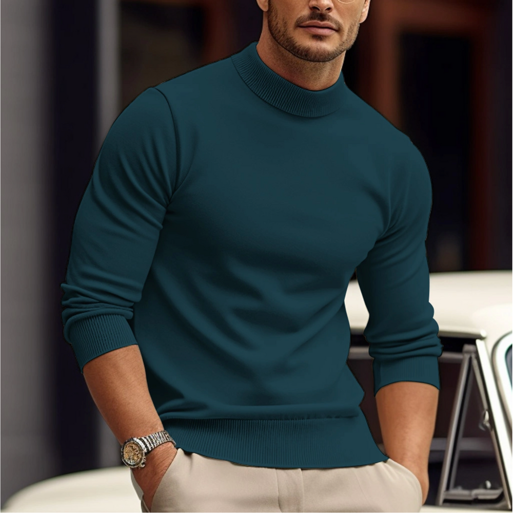 Pull col roulé ajusté pour homme, un vêtement élégant qui met en valeur la silhouette. Idéal style hiver.