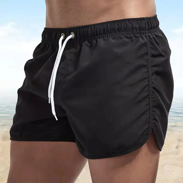 Short de bain homme à séchage rapide. Conçu pour la plage, le surf et la piscine. Idéal pour l'été.