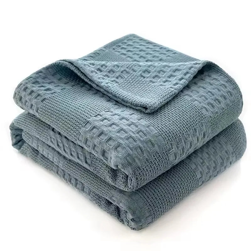 Restez frais avec cette couverture d'été en coton respirant, parfaite pour les chaudes nuits d'été.