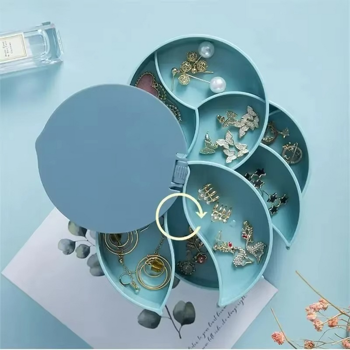 Boîte à bijoux rotative noire, organisateur compact pour coiffeuse femme, rangement élégant d'accessoires en ABS.