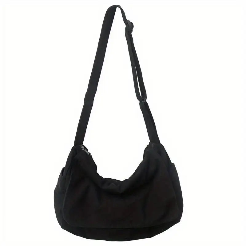 Sac besace unisexe léger et pratique en tissu recyclé. Accessoire écoresponsable pour le quotidien, design moderne.